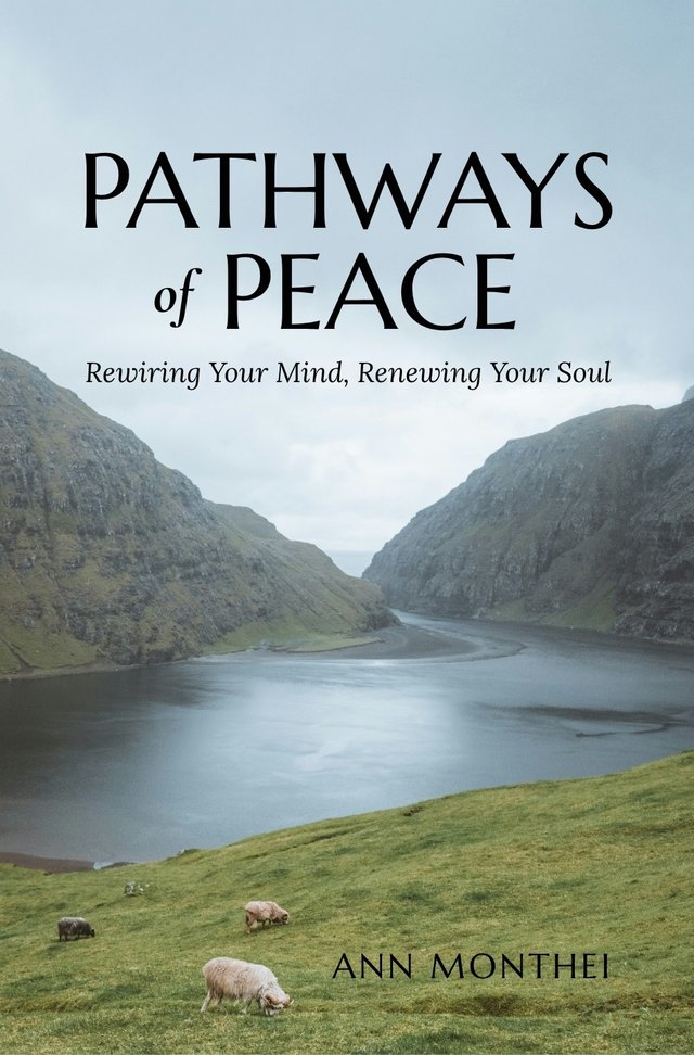Cover of Pathways of Peace: a still lake between green mountains, with sheep grazing on the slope in the foreground.